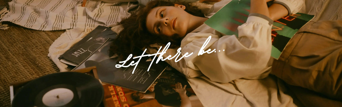 girl listening to a vinyl record